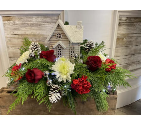 White cabin in the greens ***lights up*** Christmas