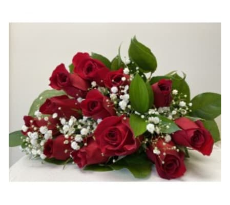 A beautiful dozen red roses wrapped
