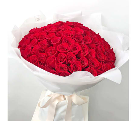 One Hundred Long Stem Premium Red Roses Wrapped