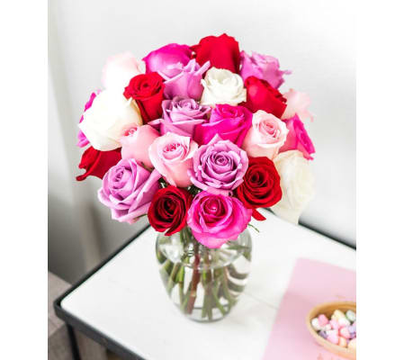 3 dozen stunning roses multi colours in a vase
