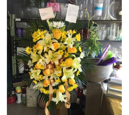 Yellow and White Funeral arrangement