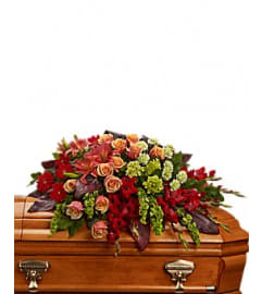 tender sympathy. An arrangement by Jerome Florist.