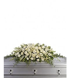 Purity And Peace. An arrangement by Jerome Florist.