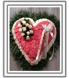 pink heart. An arrangement by Jerome Florist.