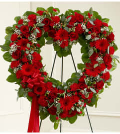 OPEN RED HEART. An arrangement by Heavenly Flowers.