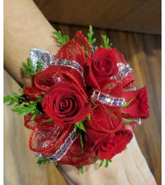 Christmas Corsage. An arrangement by Zaisers Florist and Greenhouse.
