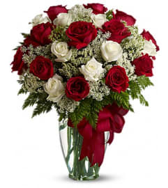LOVE'S DEVINE BQT. An arrangement by Fine's Flowers.