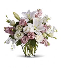 ISN'T IT ROMANTIC. An arrangement by Fine's Flowers.