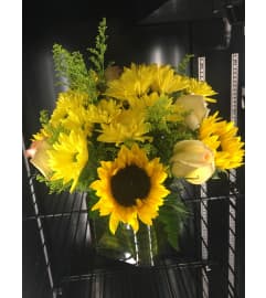 Sunflower yellow medley. An arrangement by Tarrytown Floral Designs.