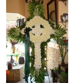 Celtic Cross all white (Please call for availability). An arrangement by Tarrytown Floral Designs.