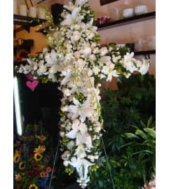 All White Cross. An arrangement by Tarrytown Floral Designs.