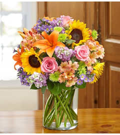 Summer Romance. An arrangement by Lynette's Flowers and Gifts.