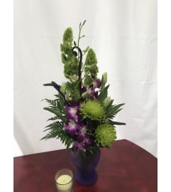Exotic Rapture. An arrangement by Awesome Flowers.