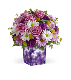 Teleflora's Dancing Violets Bouquet. An arrangement by Sunrise Greenery.