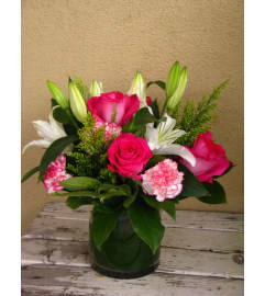 Lilies and Roses Arrangement. An arrangement by Violeta's Flower Shop.