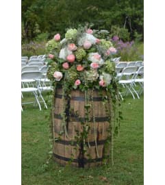 CUSTOM ARRANGEMENT TO ENHANCE YOUR CONTAINER. An arrangement by Flowers by Priscilla.