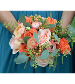 HANDTIED BOUQUET OF PEACH FLOWERS. An arrangement by Flowers by Priscilla.