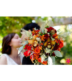 CUSTOM HANDTIED BOUQUET. An arrangement by Flowers by Priscilla.