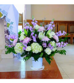 Majestic Sympathy Basket. An arrangement by Violeta's Flower Shop.