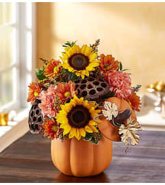 Pumpkin Harvest. An arrangement by Lynette's Flowers and Gifts.