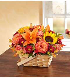 Autumn in a Basket. An arrangement by Lynette's Flowers and Gifts.