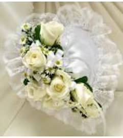 HEART SHAPE SATIN CASKET PILLOW. An arrangement by J.D. Ballantine's Flowers and Gifts. HEART SHAPE SATIN CASKET PILLOW. An arrangement by J.D. Ballantine's Flowers and Gifts.