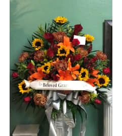 Basket W/ Banner. An arrangement by Bertha's Florist. Basket W/ Banner. An arrangement by Bertha's Florist.