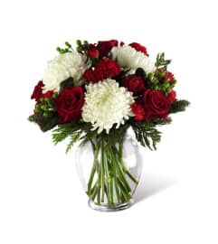 Holiday Enchantment™ Bouquet by FTD. An arrangement by Anderson Flowers. Holiday Enchantment™ Bouquet by FTD. An arrangement by Anderson Flowers.