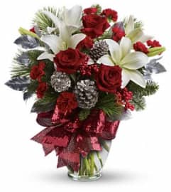 Holiday Enchantment Bouquet. An arrangement by Jennifer's Flowers and Gifts.