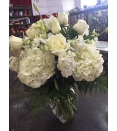 Pure Expressions. An arrangement by Commerce Flowers.