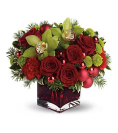 Bright and Merry. An arrangement by Chelsea Florist, Inc.