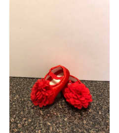 Baby Girl Shoe. An arrangement by Flamingo Floral and Gifts.