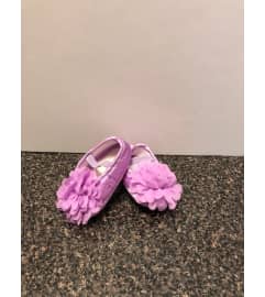 Baby Girl Shoes. An arrangement by Flamingo Floral and Gifts.