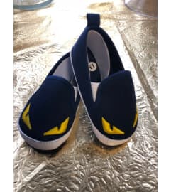 Baby Boy Shoes. An arrangement by Sunrise Floral and Gifts.