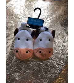 baby Boy or Girl Shoes. An arrangement by Sunrise Floral and Gifts.
