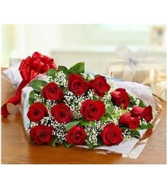 Long Stem Red Rose Bouquets (Wrapped). An arrangement by Roma James Gifts.