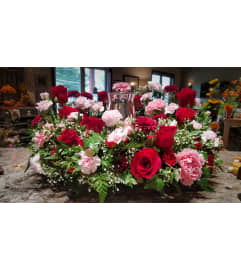 Bountiful Rose Urn Wreath. An arrangement by Zaisers Florist and Greenhouse.