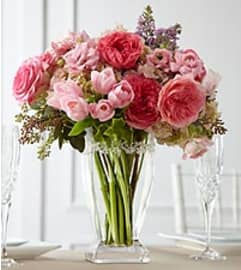 Love Me Forever. An arrangement by Charlie's Flowers and Gourmet Baskets.