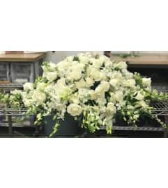 Simple As You Casket Spray. An arrangement by Massey's House of Flowers.