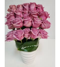 24 Roses In Modern Vase. An arrangement by Brickell Exclusive Blooms.