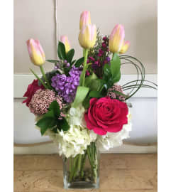 By the River. An arrangement by Blooming Hills Florist.