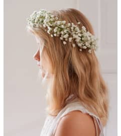 HALO RING OF BABIES BREATH with bow and streamers. An arrangement by Flowers by Priscilla.