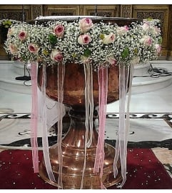 CHRISTENING FLOWERS GARLAND. An arrangement by Flowers by Priscilla.