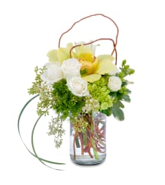 New Promise. An arrangement by The Flower Patch Florist.