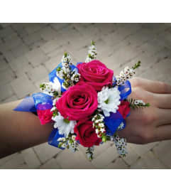 In Full Bloom Corsage. An arrangement by Zaisers Florist and Greenhouse.