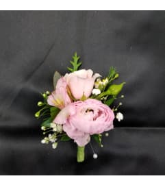 Wedding or prom Pretty n Pink Boutonniere. An arrangement by Timp Valley Floral.