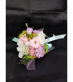 Wedding or prom Pastel Perfection Wrist Corsage. An arrangement by Timp Valley Floral.