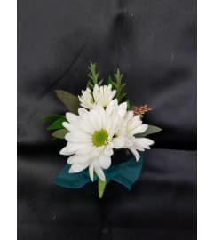 Wedding or prom simply daisy boutonniere. An arrangement by Timp Valley Floral.