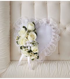 Satin Heart Casket Pillow White. An arrangement by Shalimar Flower Shop.