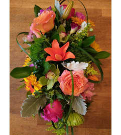 FREE SPIRIT CENTERPIECE. An arrangement by Avenue Flowers and Gifts. FREE SPIRIT CENTERPIECE. An arrangement by Avenue Flowers and Gifts.